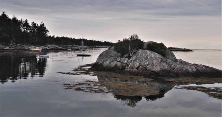 boulder in water